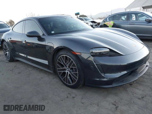 2021 Porsche Taycan with VIN WP0AA2Y15MSA18727, listed as a IAAI auction lot 41097801 with 20,933 mi miles and . Bid and sale history available at DreamBid. Image 1.