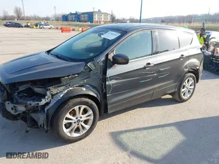 2017 Ford Escape SE with VIN 1FMCU0GD7HUC47610, listed as a IAAI auction lot 41792392 with 104,741 mi miles. Bid and sale history available at carsss.com. Image 20.