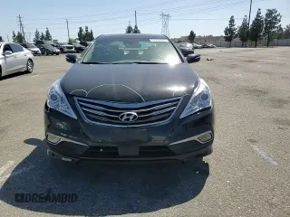 2017 Hyundai Azera Limited z VIN KMHFH4JG1HA590961, wystawiony jako Copart lot #57358035 z przebiegiem 66 985 mil mil oraz Szkoda całkowita • Salvage title. Historia ofert i sprzedaży dostępna na DreamBid. Obrazek 13.