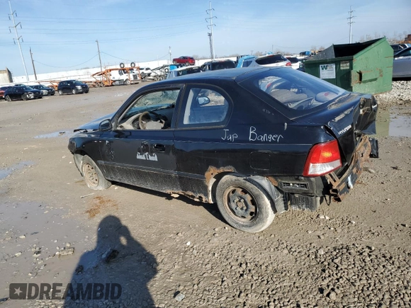 2002 Hyundai Accent z VIN KMHCF35G22U174792, wystawiony jako Copart lot #47281545 z przebiegiem 273 228 mil mil oraz Szkoda całkowita • Salvage title. Historia ofert i sprzedaży dostępna na DreamBid. Obrazek 2.