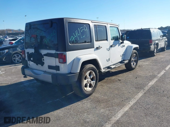 2013 Jeep Wrangler Unlimited Sahara with VIN 1C4BJWEG3DL658530, listed as a IAAI auction lot 41421006 with 115,321 mi miles and . Bid and sale history available at DreamBid. Image 4.