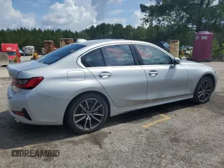 2020 BMW 3 Series 330i with VIN WBA5R1C07LFH40014, listed as a Copart auction lot 60656645 with 76,392 mi miles and Clean title. Bid and sale history available at DreamBid. Image 3.