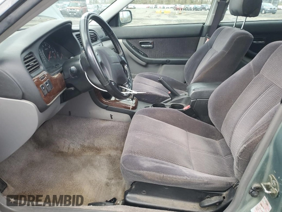 2003 Subaru Legacy L with VIN 4S3BH635437307310, listed as a Copart auction lot 86441624 with 136,189 mi miles and Salvage title. Bid and sale history available at DreamBid. Image 7.