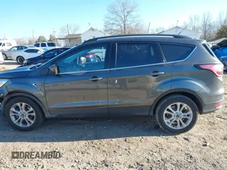 2018 Ford Escape SE with VIN 1FMCU0GD0JUA87303, listed as a IAAI auction lot 41612502 with 70,233 mi miles. Bid and sale history available at carsss.com. Image 15.