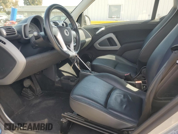 2009 Smart fortwo Pure with VIN WMEEJ31XX9K235766, listed as a Copart auction lot 54985845 with 75,708 mi miles and Clean Title. Bid and sale history available at carsss.com. Image 7.