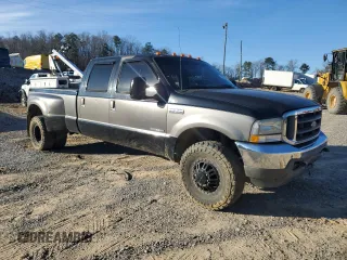 2002 Ford F-350 XL z VIN 1FTWW33F22EC09806, wystawiony jako Copart lot #87634095 z przebiegiem Nie podano mil oraz Czysty tytuł • Clean title. Historia ofert i sprzedaży dostępna na DreamBid. Obrazek 4.
