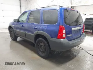 2006 Mazda Tribute i with VIN 4F2YZ92Z16KM37284, listed as a IAAI auction lot 41755952 with 129,284 mi miles and . Bid and sale history available at carsss.com. Image 3.