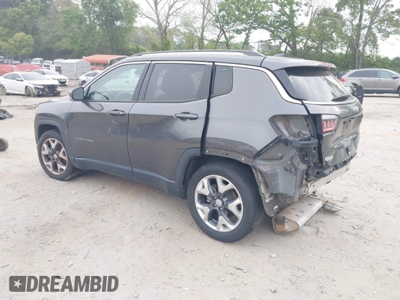 2020 Jeep Compass Limited with VIN 3C4NJCCB0LT128635, listed as a IAAI auction lot 42085121 with 166,511 mi miles and . Bid and sale history available at DreamBid. Image 3.