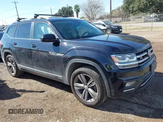 2018 Volkswagen Atlas SE with VIN 1V2FR2CA9JC537903, listed as a IAAI auction lot 41386874 with 118,764 mi miles and . Bid and sale history available at DreamBid. Image 1.