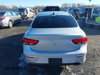 2023 Kia Rio LX with VIN 3KPA24ADXPE606463, listed as a IAAI auction lot 41728523 with 8,909 mi miles and . Bid and sale history available at DreamBid. Image 16.