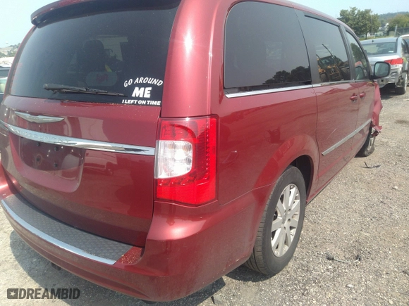 2014 Chrysler Town & Country Touring with VIN 2C4RC1BG1ER164465, listed as a IAAI auction lot 40089826 with 132,980 mi miles. Bid and sale history available at carsss.com. Image 4.