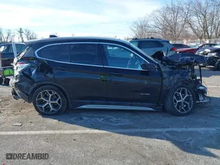 2017 BMW X1 xDrive28i with VIN WBXHT3C37H5F82992, listed as a IAAI auction lot 41293740 with 161,418 mi miles. Bid and sale history available at carsss.com. Image 13.