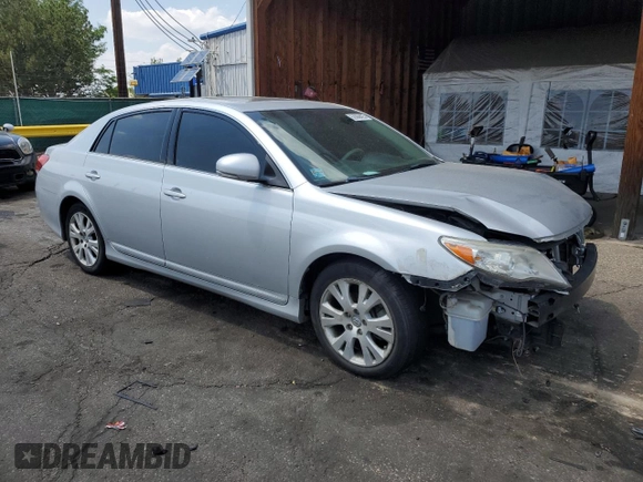 2012 Toyota Avalon with VIN 4T1BK3DB3CU454154, listed as a Copart auction lot 62866425 with 119,068 mi miles and Salvage title. Bid and sale history available at DreamBid. Image 4.