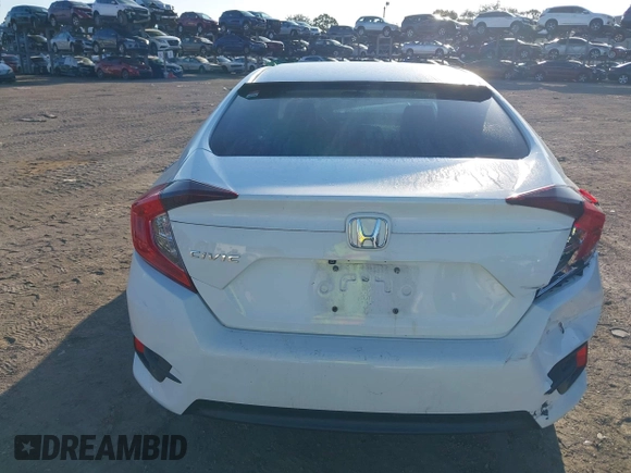 2017 Honda Civic LX with VIN 19XFC2F56HE004511, listed as a IAAI auction lot 42562420 with 59,975 mi miles and . Bid and sale history available at DreamBid. Image 16.
