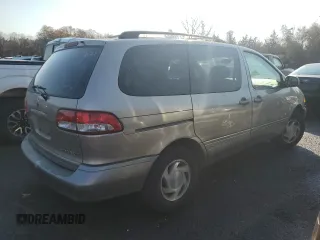 2002 Toyota Sienna LE with VIN 4T3ZF13C52U458553, listed as a Copart auction lot 77957754 with 164,058 mi miles and Salvage Title. Bid and sale history available at carsss.com. Image 3.