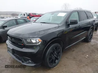 2019 Dodge Durango SXT Plus with VIN 1C4RDJAG6KC651227, listed as a IAAI auction lot 41387717 with 161,065 mi miles and . Bid and sale history available at DreamBid. Image 18.