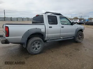 2002 Nissan Frontier SE with VIN 1N6ED27T92C379360, listed as a Copart auction lot 51235495 with 230,598 mi miles and Salvage title. Bid and sale history available at DreamBid. Image 3.