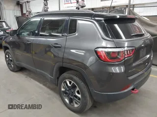 2018 Jeep Compass Trailhawk with VIN 3C4NJDDB5JT451600, listed as a IAAI auction lot 41893541 with 155,528 mi miles and . Bid and sale history available at DreamBid. Image 3.