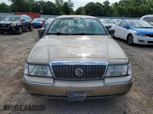 2005 Mercury Grand Marquis LS Premium z VIN 2MEFM75W65X609038, wystawiony jako Copart lot #55766005 z przebiegiem 132 136 mil mil oraz Szkoda całkowita • Salvage title. Historia ofert i sprzedaży dostępna na DreamBid. Obrazek 5.