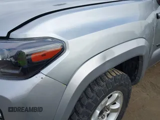 2023 Toyota Tacoma SR z VIN 3TMCZ5AN0PM538974, wystawiony jako IAAI lot #42510020 z przebiegiem 31 281 mil mil oraz . Historia ofert i sprzedaży dostępna na DreamBid. Obrazek 18.