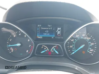 2014 Ford Escape SE z VIN 1FMCU9GX4EUC33710, wystawiony jako IAAI lot #42549888 z przebiegiem 117 057 mil mil oraz . Historia ofert i sprzedaży dostępna na DreamBid. Obrazek 7.