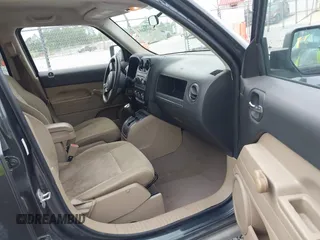2011 Jeep Patriot Latitude with VIN 1J4NT1GA0BD129377, listed as a IAAI auction lot 42098404 with 212,834 mi miles. Bid and sale history available at carsss.com. Image 5.