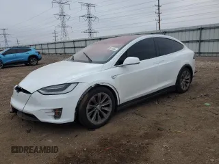 2016 Tesla Model X 70D z VIN 5YJXCBE25GF016928, wystawiony jako Copart lot #83615564 z przebiegiem Nie podano mil oraz Szkody całkowita. Historia ofert i sprzedaży dostępna na DreamBid. Obrazek 1.
