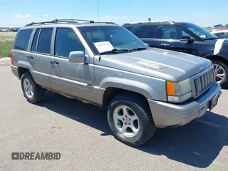 1998 Jeep Grand Cherokee Limited with VIN 1J4GZ88Z4WC328450, listed as a IAAI auction lot 42652126 with 166,576 mi miles and . Bid and sale history available at DreamBid. Image 1.