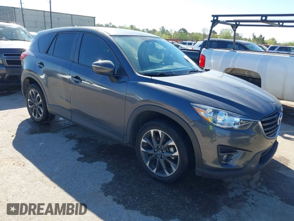 2016 Mazda CX-5 Grand Touring with VIN JM3KE2DYXG0784615, listed as a IAAI auction lot 41846853 with 72,185 mi miles. Bid and sale history available at carsss.com. Image 1.