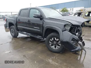 2019 Toyota Tacoma SR z VIN 3TMCZ5AN7KM191832, wystawiony jako IAAI lot #41785917 z przebiegiem 85 631 mil mil oraz . Historia ofert i sprzedaży dostępna na DreamBid. Obrazek 1.