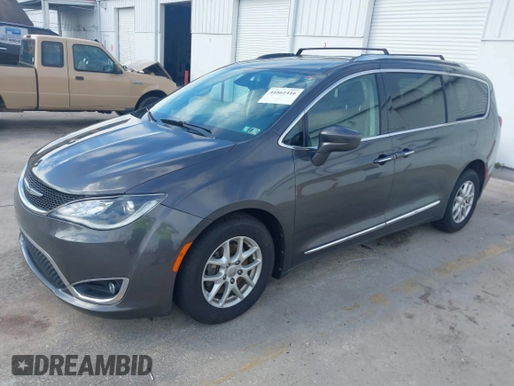 2020 Chrysler Pacifica Touring L z VIN 2C4RC1BG7LR284994, wystawiony jako IAAI lot #41661416 z przebiegiem 101 257 mil mil oraz . Historia ofert i sprzedaży dostępna na DreamBid. Obrazek 2.