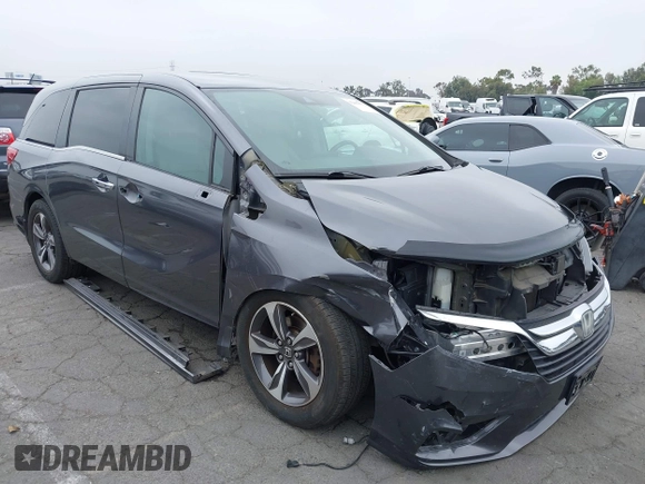 2018 Honda Odyssey Touring with VIN 5FNRL6H88JB062213, listed as a IAAI auction lot 42489379 with 90,578 mi miles and . Bid and sale history available at DreamBid. Image 1.