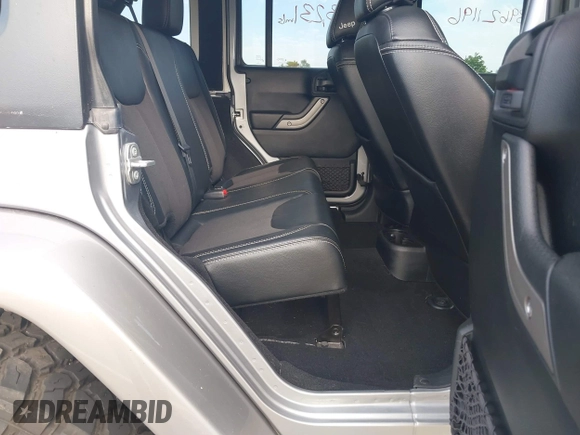2018 Jeep Wrangler Unlimited Sport S with VIN 1C4BJWDG5JL827850, listed as a IAAI auction lot 39621196 with 93,231 mi miles and . Bid and sale history available at DreamBid. Image 8.