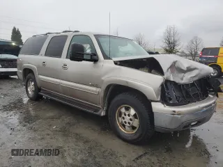 2000 Chevrolet Suburban LS with VIN 3GNFK16TXYG205867, listed as a Copart auction lot 87032424 with 307,632 mi miles and Salvage title. Bid and sale history available at DreamBid. Image 4.