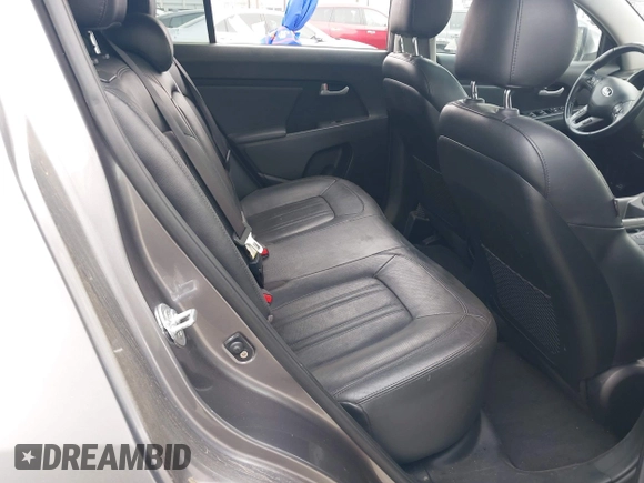2014 Kia Sportage EX with VIN KNDPC3AC9E7571730, listed as a IAAI auction lot 42164657 with 77,045 mi miles and . Bid and sale history available at DreamBid. Image 8.