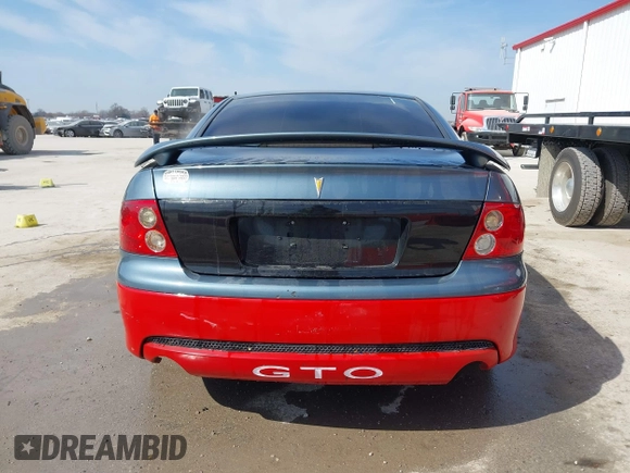 2005 Pontiac GTO with VIN 6G2VX12UX5L407635, listed as a IAAI auction lot 41768211 with 82,365 mi miles. Bid and sale history available at carsss.com. Image 16.