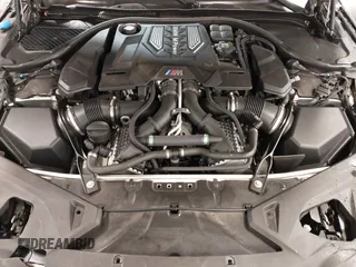 2022 BMW M8 Competition z VIN WBSGV0C04NCH71560, wystawiony jako IAAI lot #41542278 z przebiegiem 28 117 mil mil oraz . Historia ofert i sprzedaży dostępna na DreamBid. Obrazek 10.