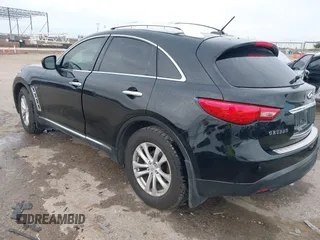 2014 Infiniti QX70 z VIN JN8CS1MU6EM450640, wystawiony jako IAAI lot #42335811 z przebiegiem 143 565 mil mil oraz . Historia ofert i sprzedaży dostępna na DreamBid. Obrazek 3.