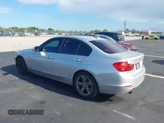 2015 BMW 3 Series 320i with VIN WBA3B1G53FNT05936, listed as a IAAI auction lot 42591667 with 143,594 mi miles and . Bid and sale history available at DreamBid. Image 3.