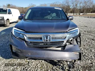 2021 Honda Pilot EX-L with VIN 5FNYF5H57MB027475, listed as a Copart auction lot 42239455 with 66,713 mi miles and Salvage Title. Bid and sale history available at carsss.com. Image 5.