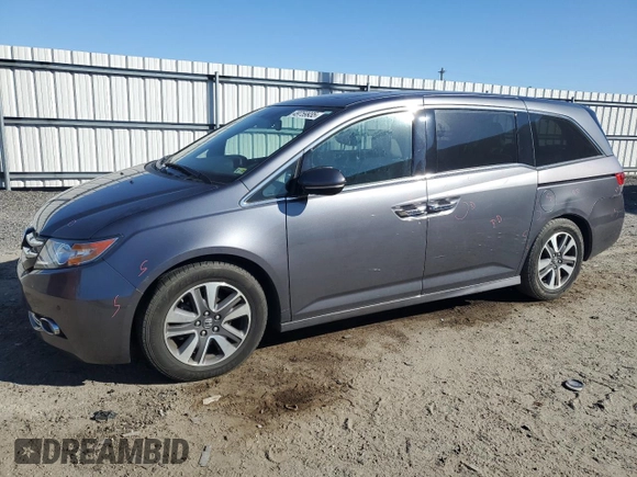 2014 Honda Odyssey Touring with VIN 5FNRL5H96EB061876, listed as a Copart auction lot 49759935 with 132,591 mi miles and Salvage Title. Bid and sale history available at DreamBid. Image 1.
