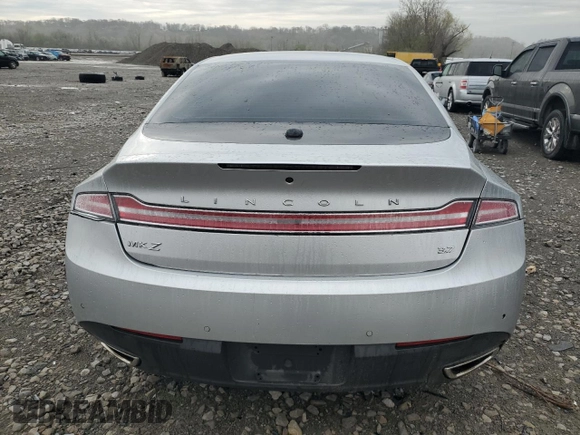 2013 Lincoln MKZ z VIN 3LN6L2GKXDR817613, wystawiony jako Copart lot #50604405 z przebiegiem Nie podano mil oraz Szkoda całkowita • Salvage title. Historia ofert i sprzedaży dostępna na DreamBid. Obrazek 6.
