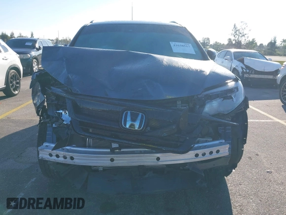 2022 Honda Pilot Special Edition with VIN 5FNYF5H25NB031399, listed as a IAAI auction lot 41638517 with 34,239 mi miles and . Bid and sale history available at carsss.com. Image 6.