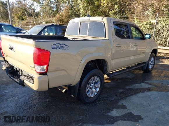2017 Toyota Tacoma SR5 with VIN 3TMCZ5ANXHM088347, listed as a IAAI auction lot 41591318 with 103,800 mi miles and . Bid and sale history available at DreamBid. Image 4.