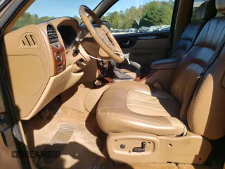 2002 GMC Envoy SLT with VIN 1GKDT13S022456264, listed as a Copart auction lot 76556004 with 230,954 mi miles and Salvage Title. Bid and sale history available at DreamBid. Image 7.