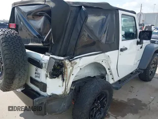2015 Jeep Wrangler Willys Wheeler with VIN 1C4AJWAG0FL562536, listed as a IAAI auction lot 42384747 with 103,507 mi miles and . Bid and sale history available at DreamBid. Image 6.