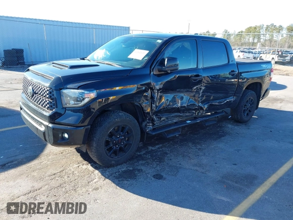 2021 Toyota Tundra SR5 with VIN 5TFDY5F13MX005925, listed as a IAAI auction lot 41352132 with 57,470 mi miles and . Bid and sale history available at DreamBid. Image 2.