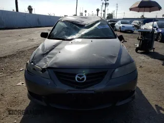2005 Mazda 6 Sport S with VIN 1YVHP82D355M75191, listed as a Copart auction lot 61158974 with 153,808 mi miles and Salvage Title. Bid and sale history available at DreamBid. Image 5.