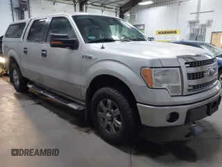 2014 Ford F-150 XL with VIN 1FTFW1EFXEFB69619, listed as a IAAI auction lot 41360500 with 196,708 mi miles and . Bid and sale history available at carsss.com. Image 1.
