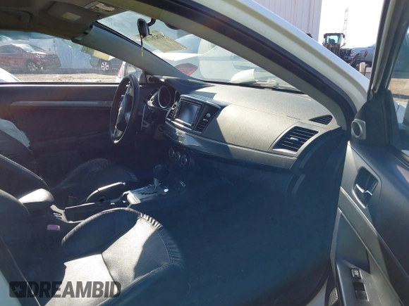 2011 Mitsubishi Lancer GTS with VIN JA32U8FW3BU030708, listed as a IAAI auction lot 41826170 with 213,889 mi miles. Bid and sale history available at carsss.com. Image 5.